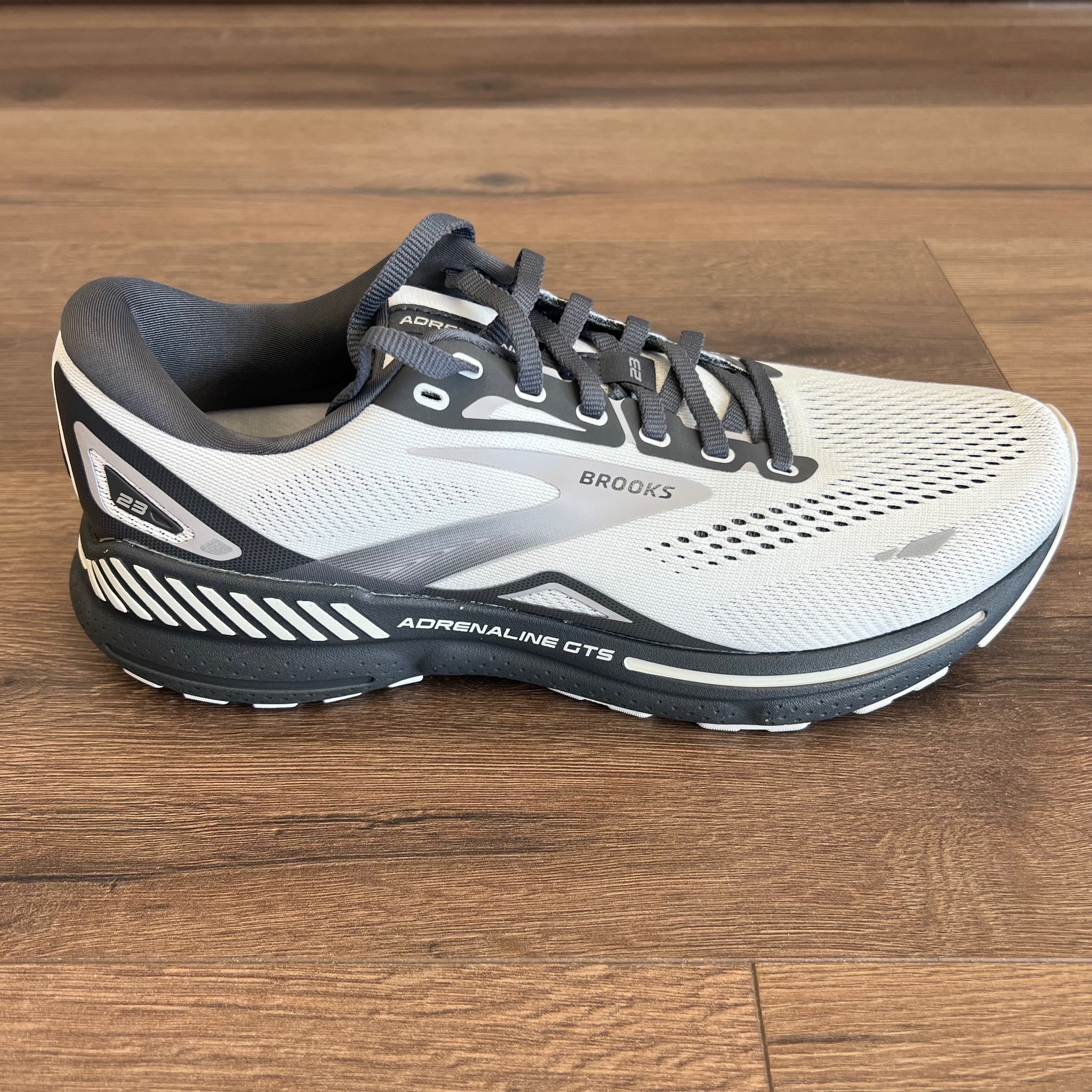 Brooks Men s Adrenaline GTS 23 110391 2E 065 WIDE Oyster Ebony Alloy Solid Rock Running Company
