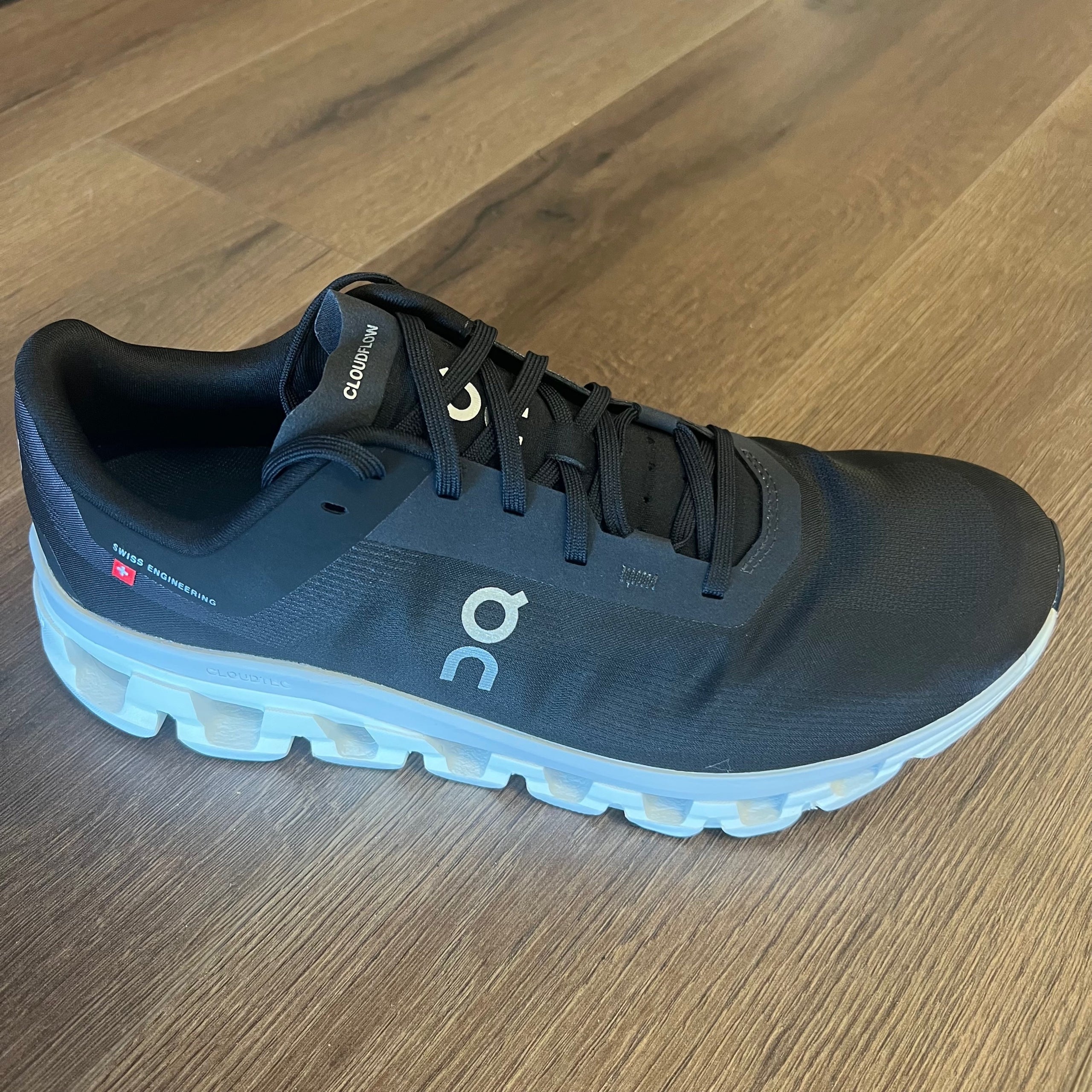 On Men s Cloudflow 4 3MD30100299 Black White Solid Rock Running Company